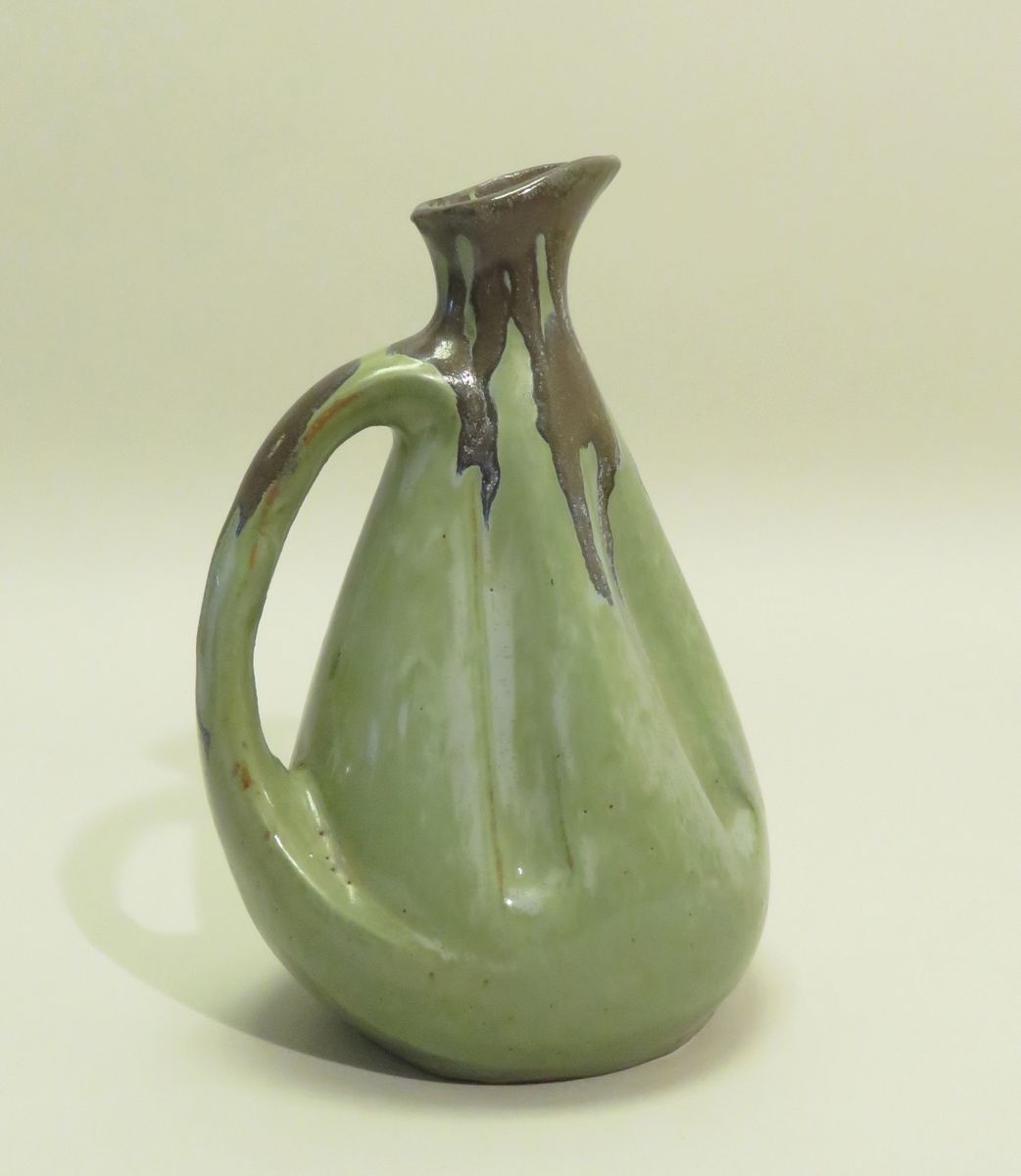 Null Pitcher of form moved in stoneware enamelled with castings. Around 1930. 22&hellip;