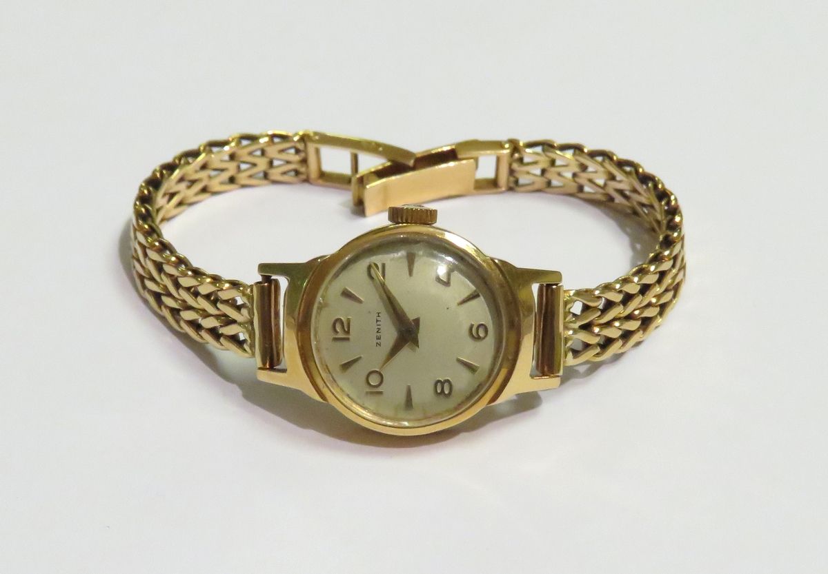 Null ZENITH. Montre bracelet pour dame en or jaune (18K). Le bracelet en or jaun&hellip;