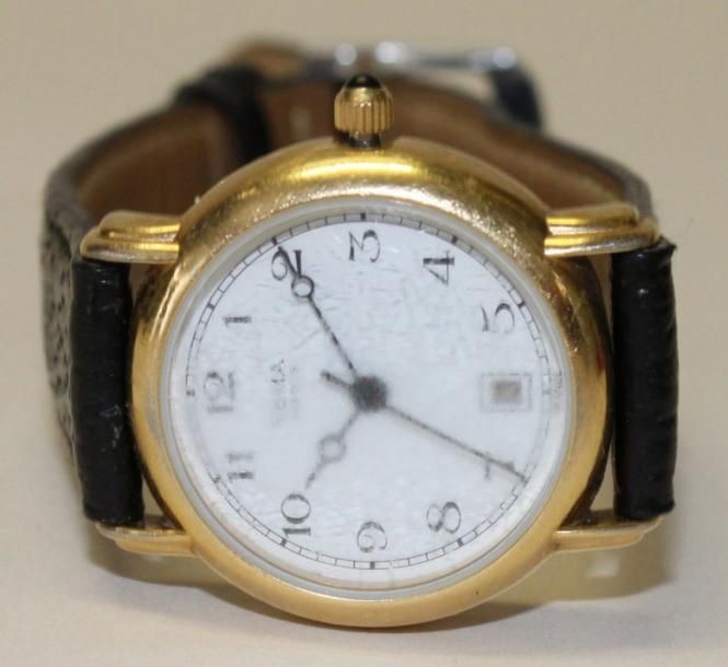 YEMA Montre pour dame en plaqué-or jaune et acier, le cadran rond sur fond blanc&hellip;