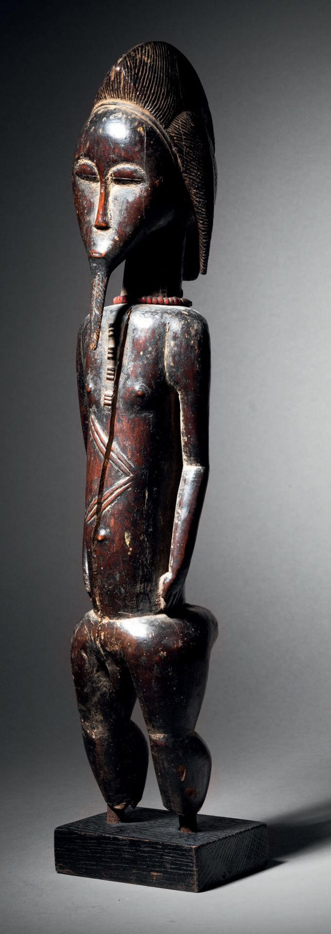 Null Statua Baule, Blolo bian, Costa d'Avorio
Legno e perline
H. 40 cm
Figura Ba&hellip;