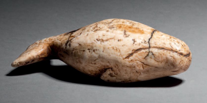 Null Whale-shaped charm,
Inuit (Eskimo), Alaska or Siberia
Marine ivory
H. 5 cm &hellip;