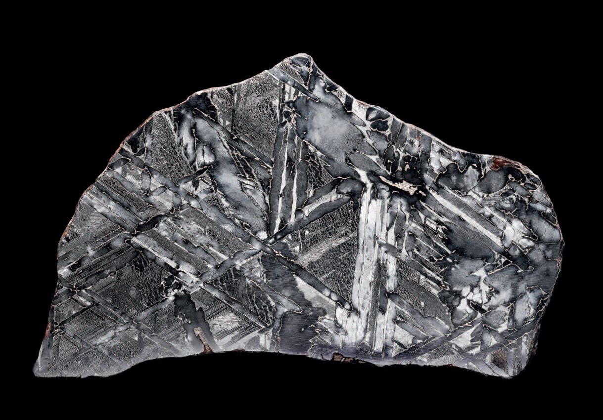 Null Meteorite slice with Widmanstätten
L. 5 1/8 in - L. 3 1/8 in - Weight: 163,&hellip;