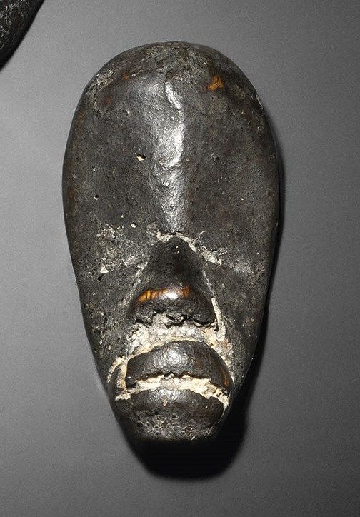 Null Miniature Dan mask, Republic of Ivory Coast 
Wood, slightly crusty black pa&hellip;