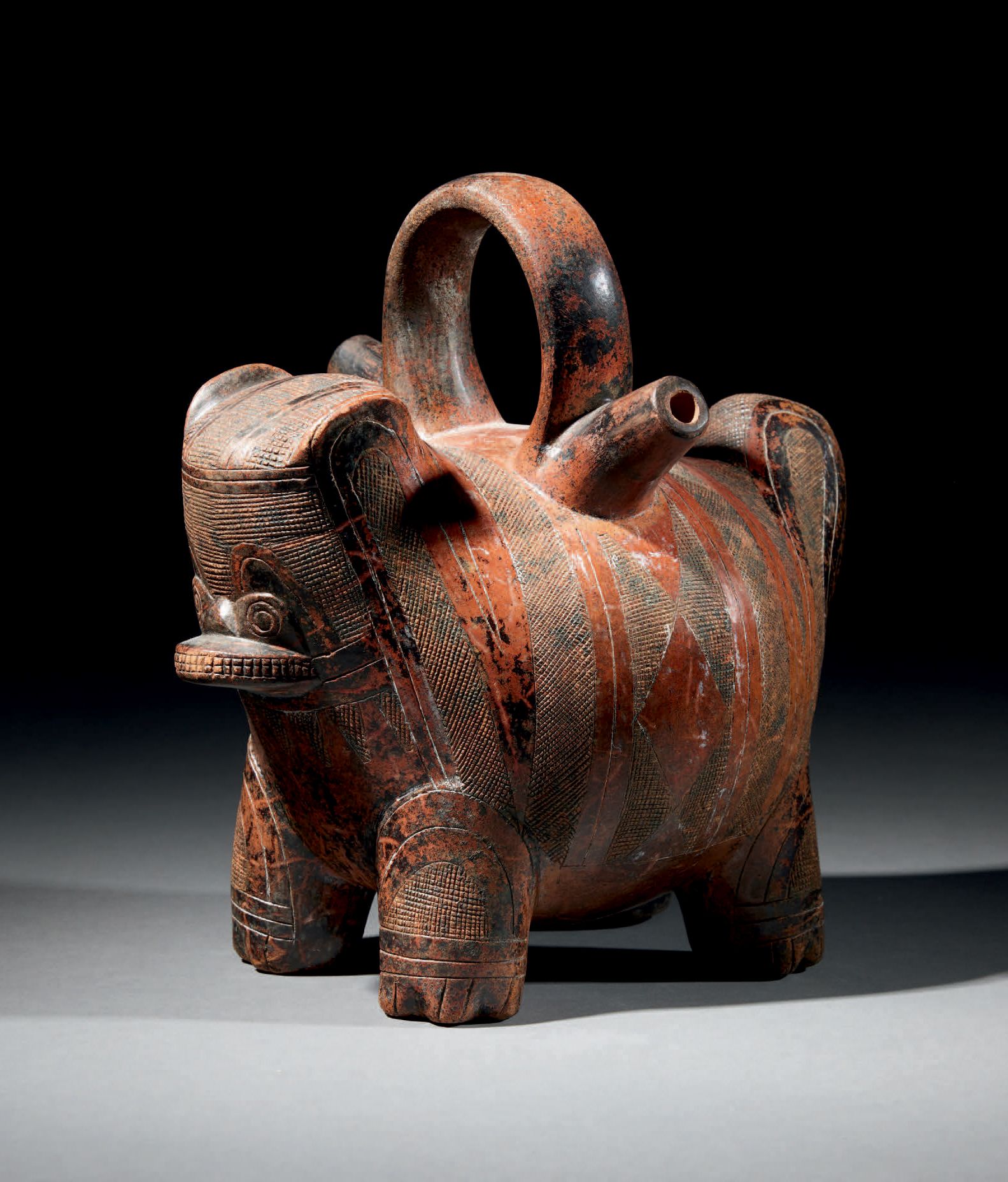 Null 
calima文化，哥伦比亚
yotoco阶段，公元前100-公元800年，表现风格化猫科动物的花瓶。C.
陶瓷，红褐色滑液，锰氧化物
高22.5厘米&hellip;