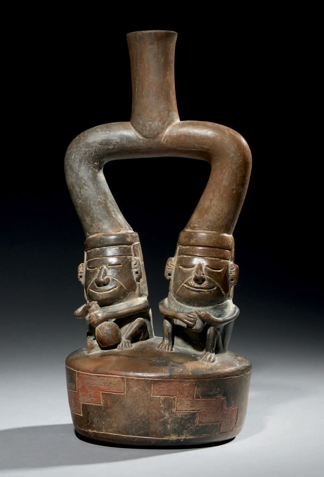 Null Ɵ Chavín (Tembladera) stirrup vessel with two seated figures, Peru, ceramic&hellip;