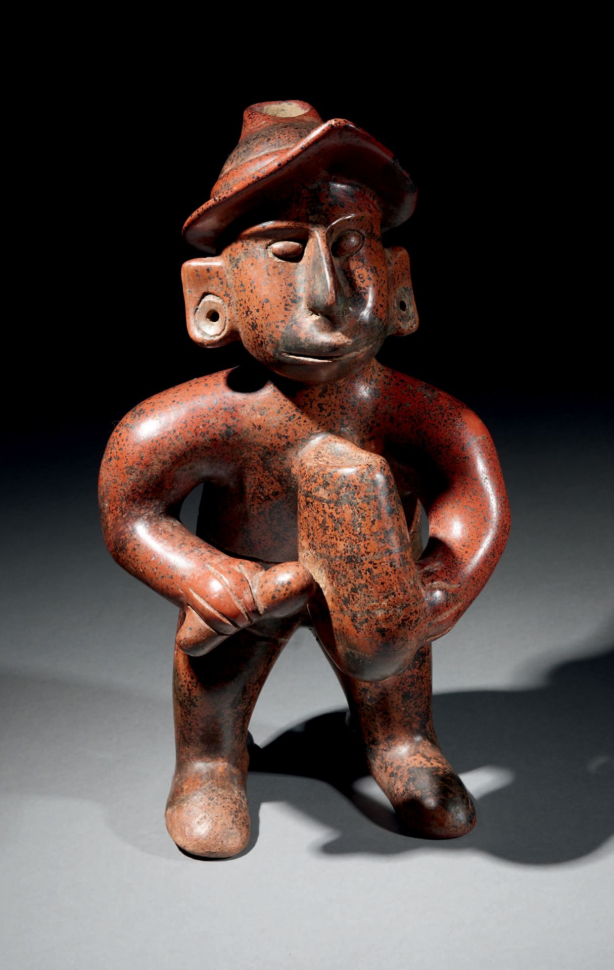 Null Ɵ Colima standing musician, Mexico, ceramic with red slip, manganese oxides&hellip;