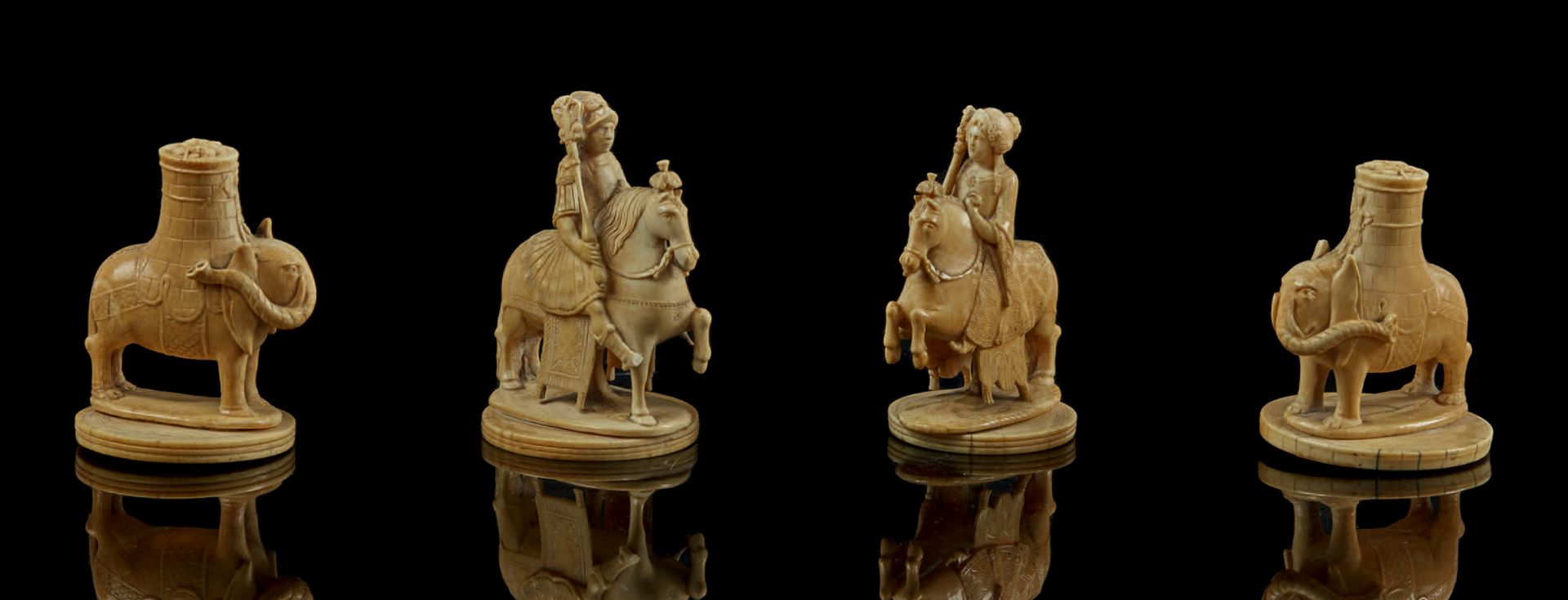 Null 
Rare suite de quatre pièces d'un même jeu d'échecs en ivoire finement scul&hellip;