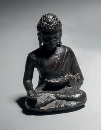 Null Seated Buddha, 12th century ? Vietnam ?
H. 8 cm. Copper alloy, solid cast
S&hellip;
