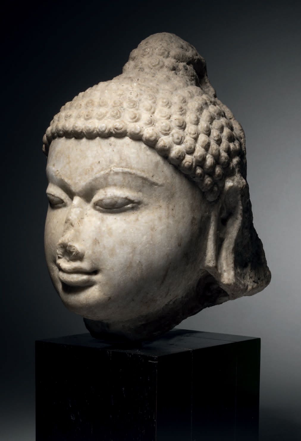 Null Tête de Tirthankara Jain, Nord-Ouest de l'Inde, 10-11e siècle H. 20 cm. Mar&hellip;