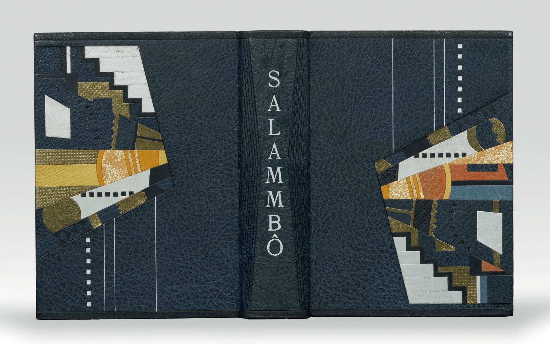 FLAUBERT (Gustave). 萨拉曼波。巴黎，Le Livre，1923年。8开本，午夜蓝摩洛哥，彩色、金色和钯色的马赛克组成（每个封面都不同），书脊&hellip;