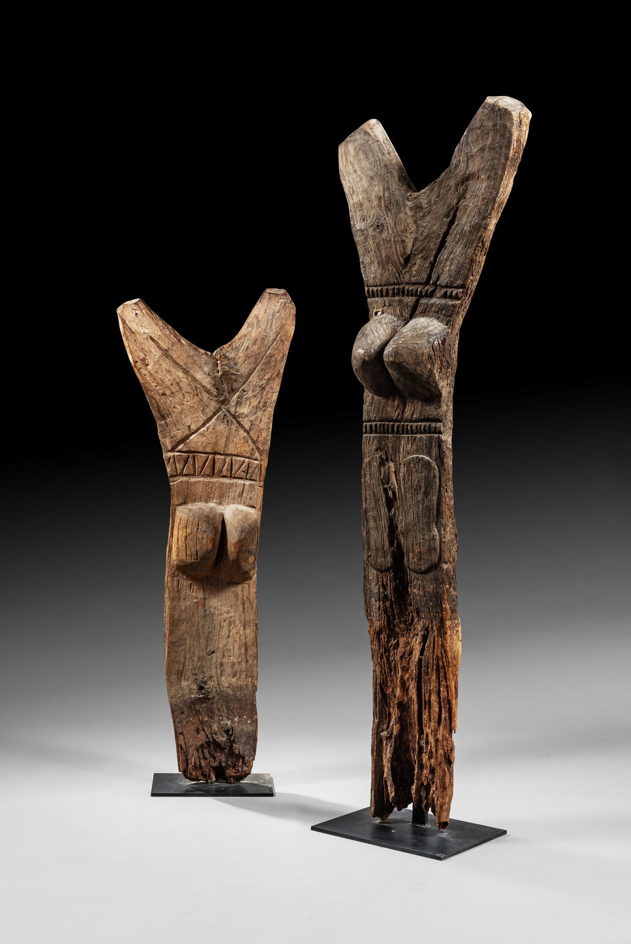 Null Two toguna hut posts, Dogon, Mali H. 135 and 174 cm