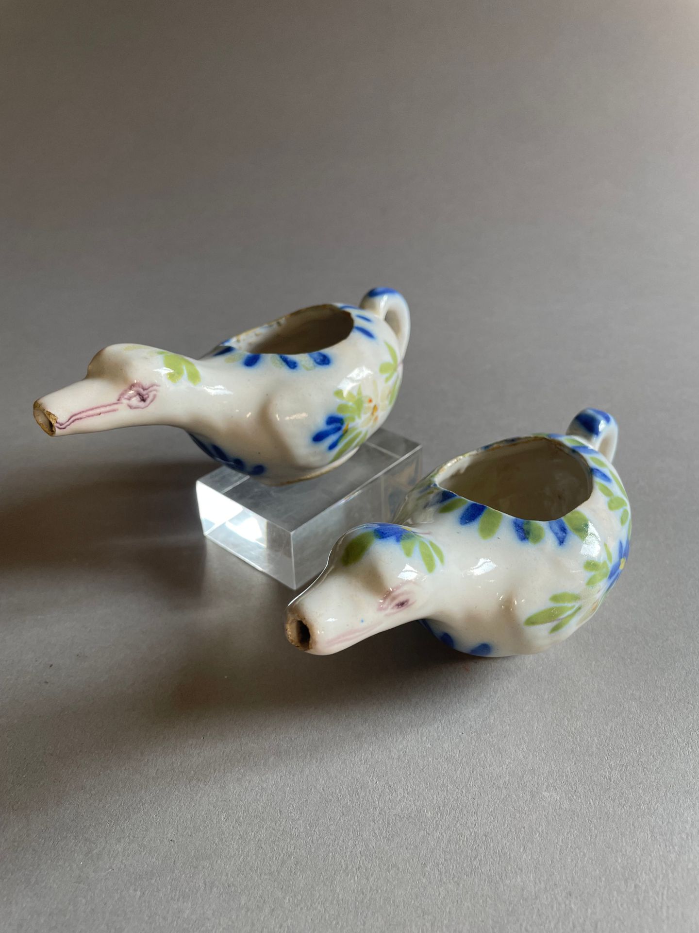 Auvillar Two earthenware duck-shaped sick ducks with polychrome decoration of fl&hellip;