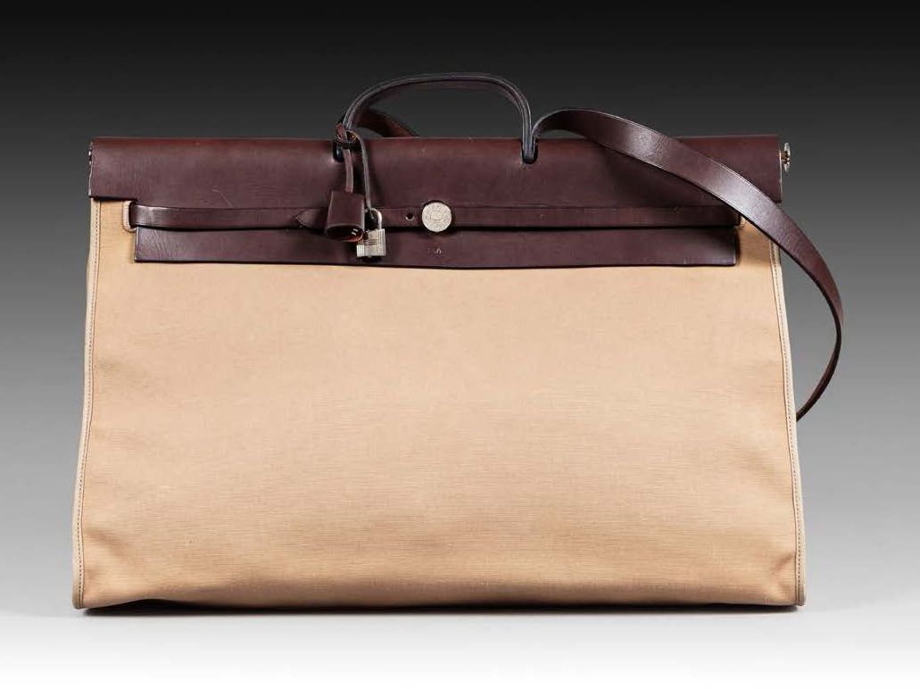 HERMÈS Paris Herbag 51" bag in brown leather and beige canvas, silver metal clas&hellip;