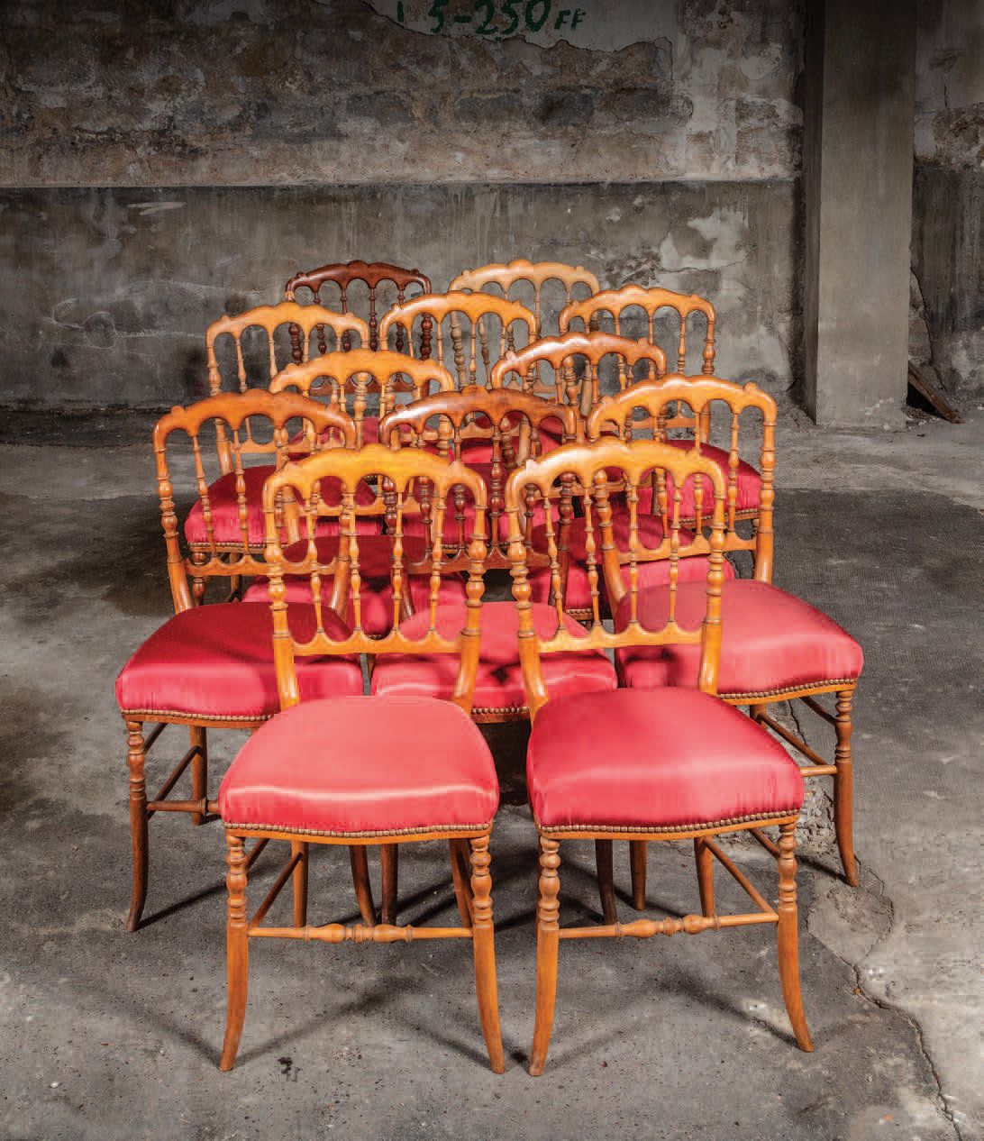 Null Suite of twelve natural wood "Chiavari" type chairs covered with red faille&hellip;