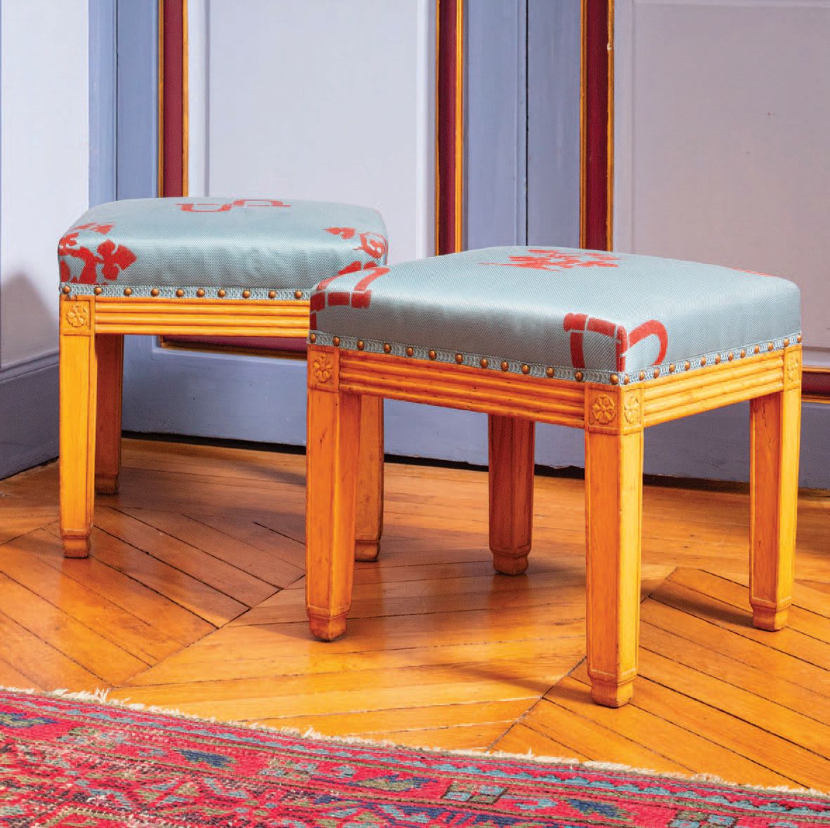 Null Pair of molded wood stools.
Straight legs. Grooved belt.
Circa 1800
RT" ste&hellip;