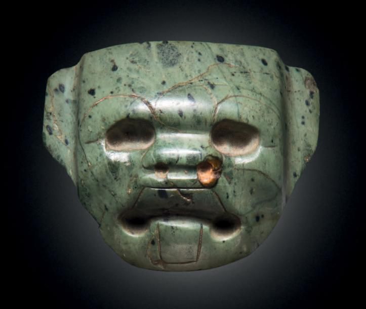 Null PENDENTIF-TÊTE DE JAGUAR
Culture Olmèque, Mexique
Préclassique moyen, 900-4&hellip;