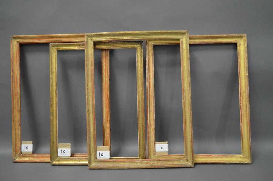 Null QUATRE BAGUETTES en bois mouluré et doré.
Début du XIXe siècle (usures et p&hellip;