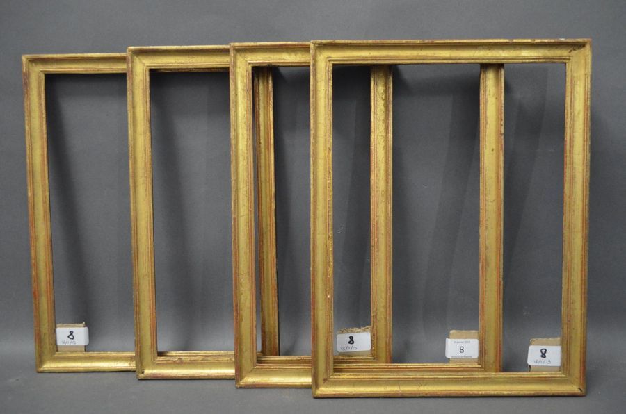 Null SUITE DE QUATRE BAGUETTES en bois mouluré et doré.
Début du XIXe siècle (re&hellip;
