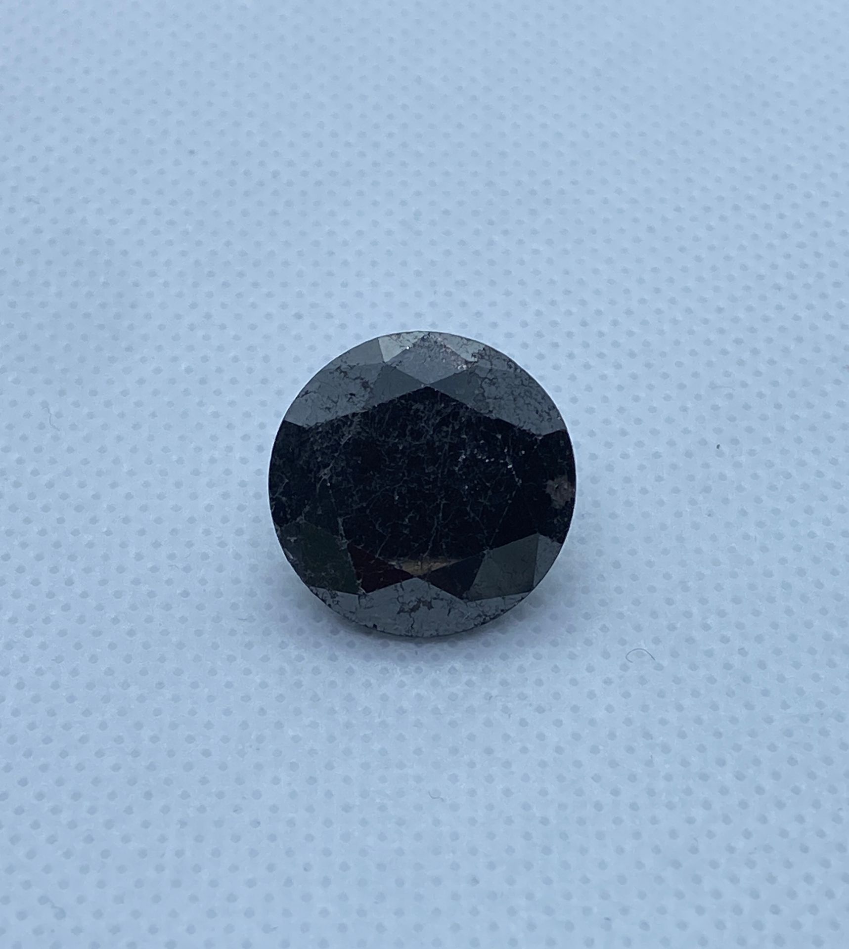 Diamant BLACK DIAMOND of 21.74 carat AIGT certificate