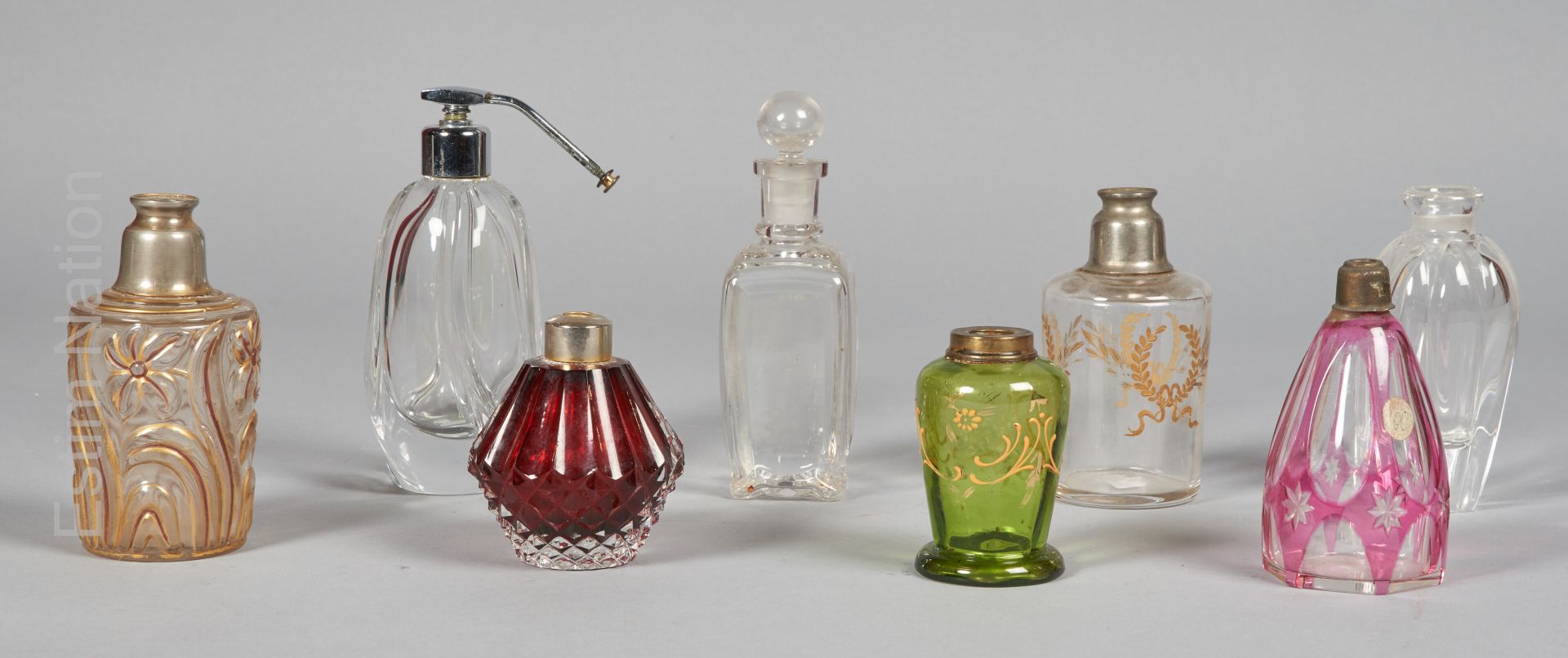 FLACONS DE PARFUMS Important lot of empty glass and crystal bottles, one of them&hellip;