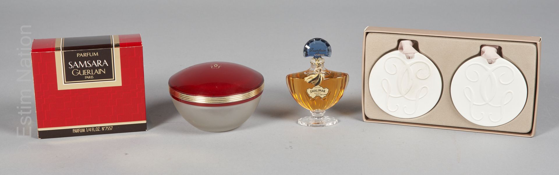 Guerlain 
Lot including :











- A box containing two scented ceramics.


&hellip;