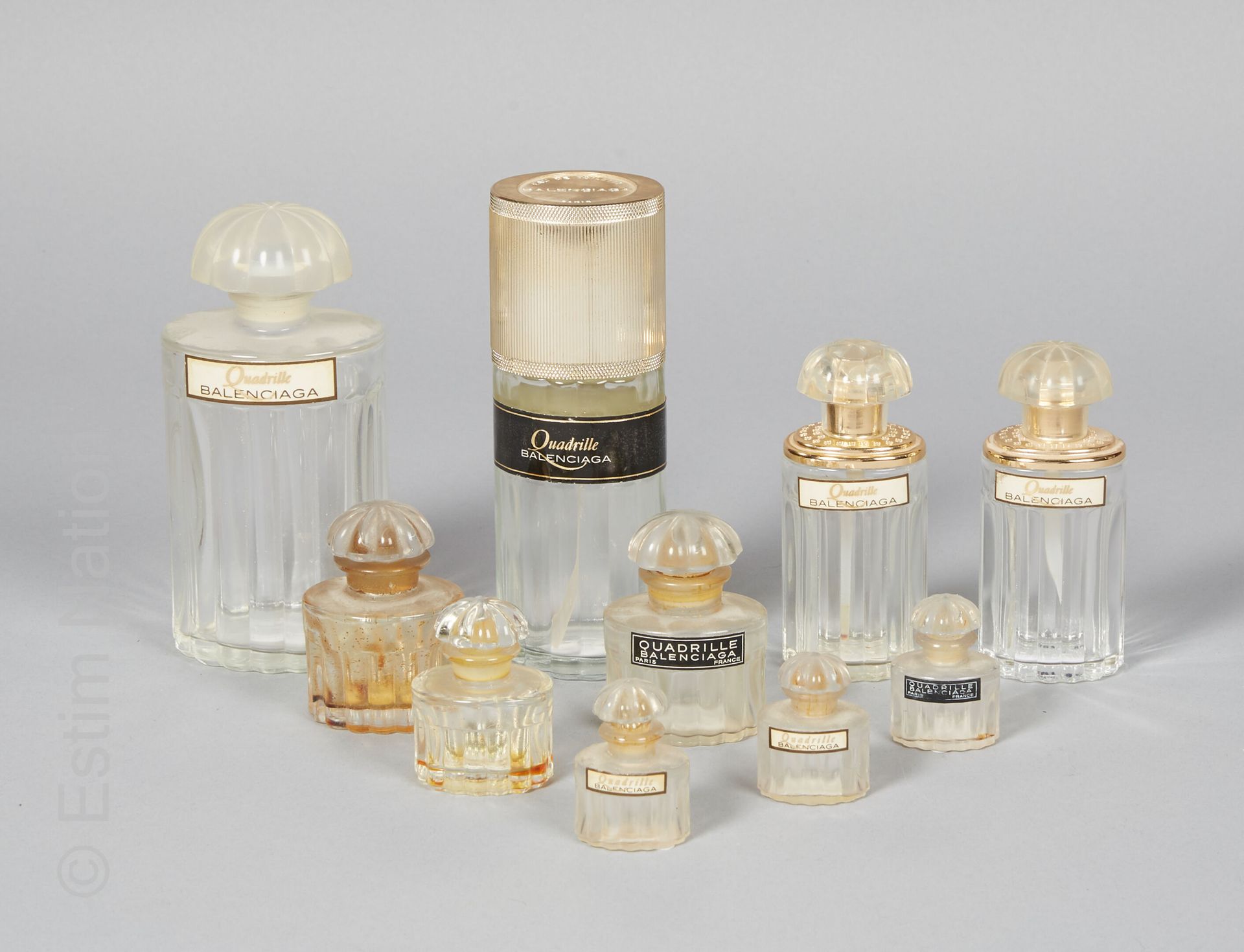 FLACONS DE PARFUM BALENCIAGA, quadrille, set of seven glass bottles molded with &hellip;