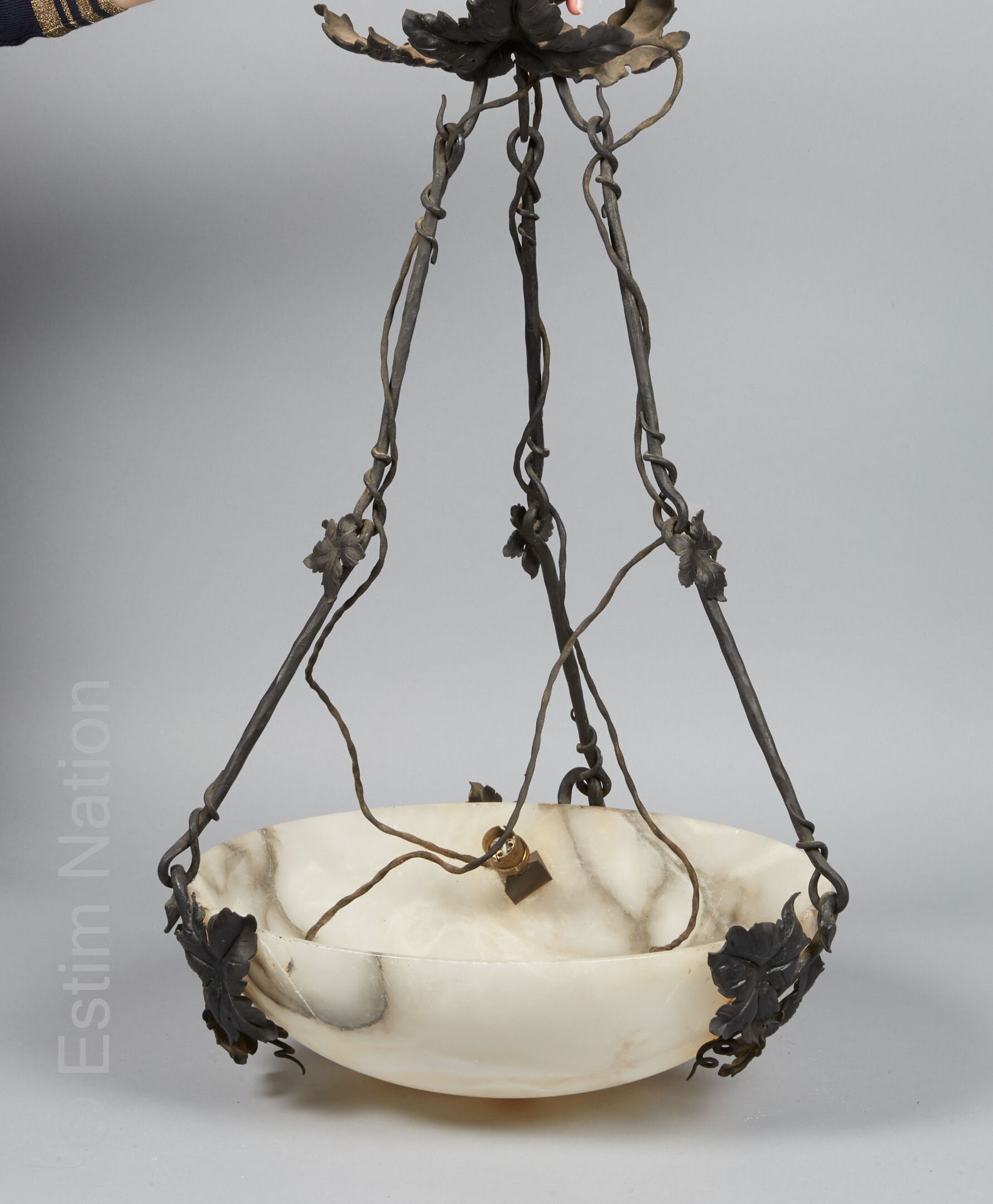 ARTS DECORATIFS XXE SIECLE Suspension in alabaster and wrought iron. The half-sp&hellip;