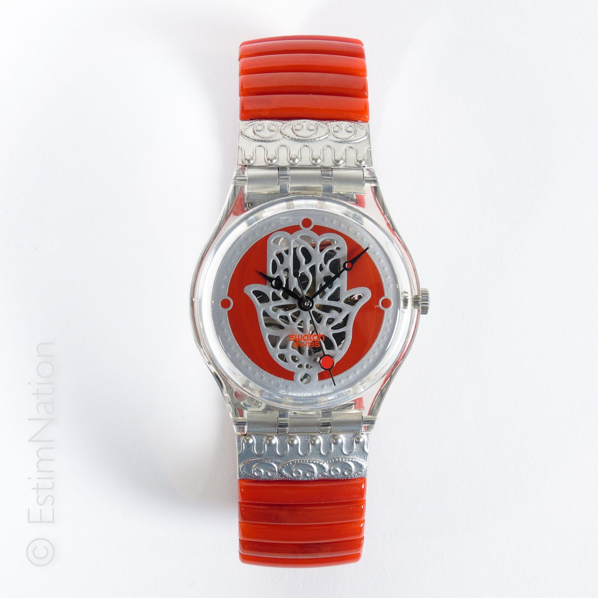 SWATCH - WISEHAND - 1996 样板间--明智之手

原创：绅士



标准手表，表盘上装饰有红色背景的法特玛手的镂空图案，透明塑料表壳，带红&hellip;