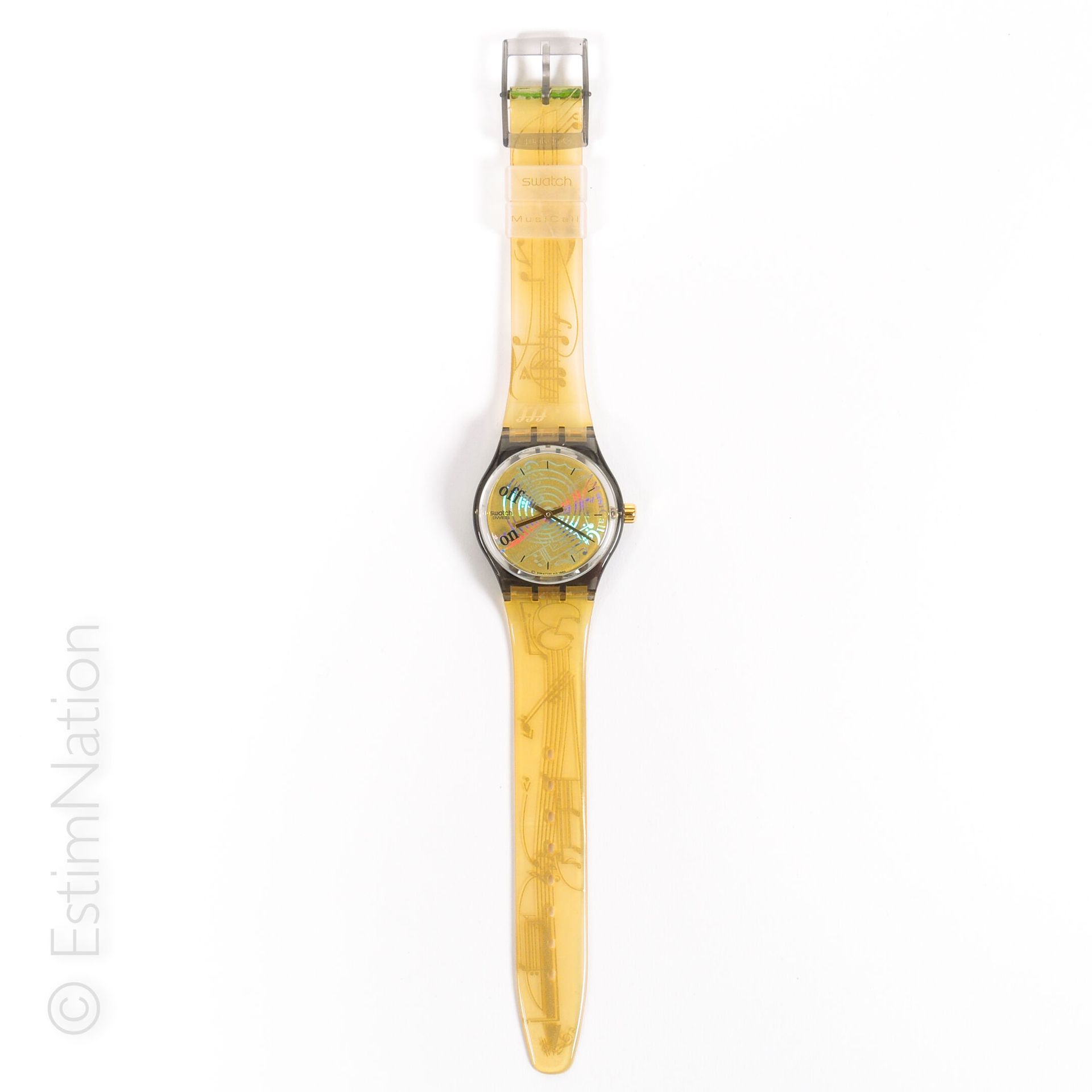 SWATCH - SPARTITO - 1993 斯沃琪--斯巴蒂托

原创：Musicall



带闹钟功能的标准手表，带螺旋和音符的金色表盘，透明塑料表壳&hellip;