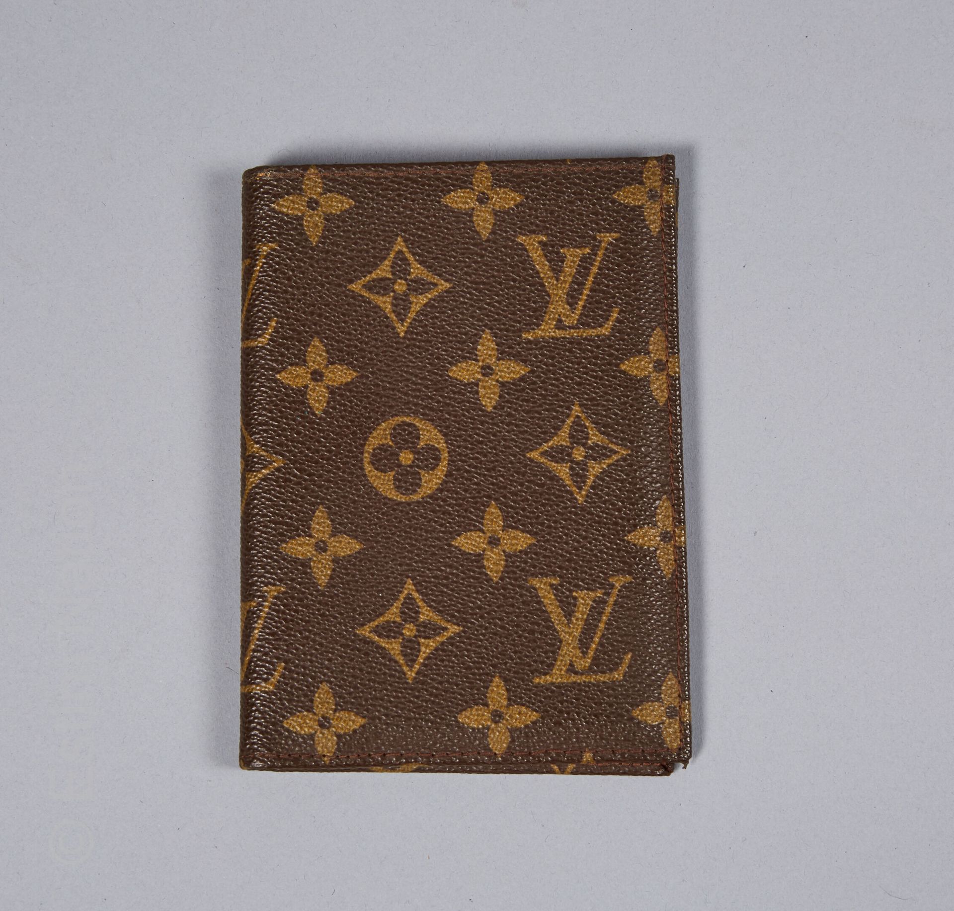 LOUIS VUITTON CIRCA 1970 Wallet in Monogram canvas, inside in peccary, decorated&hellip;