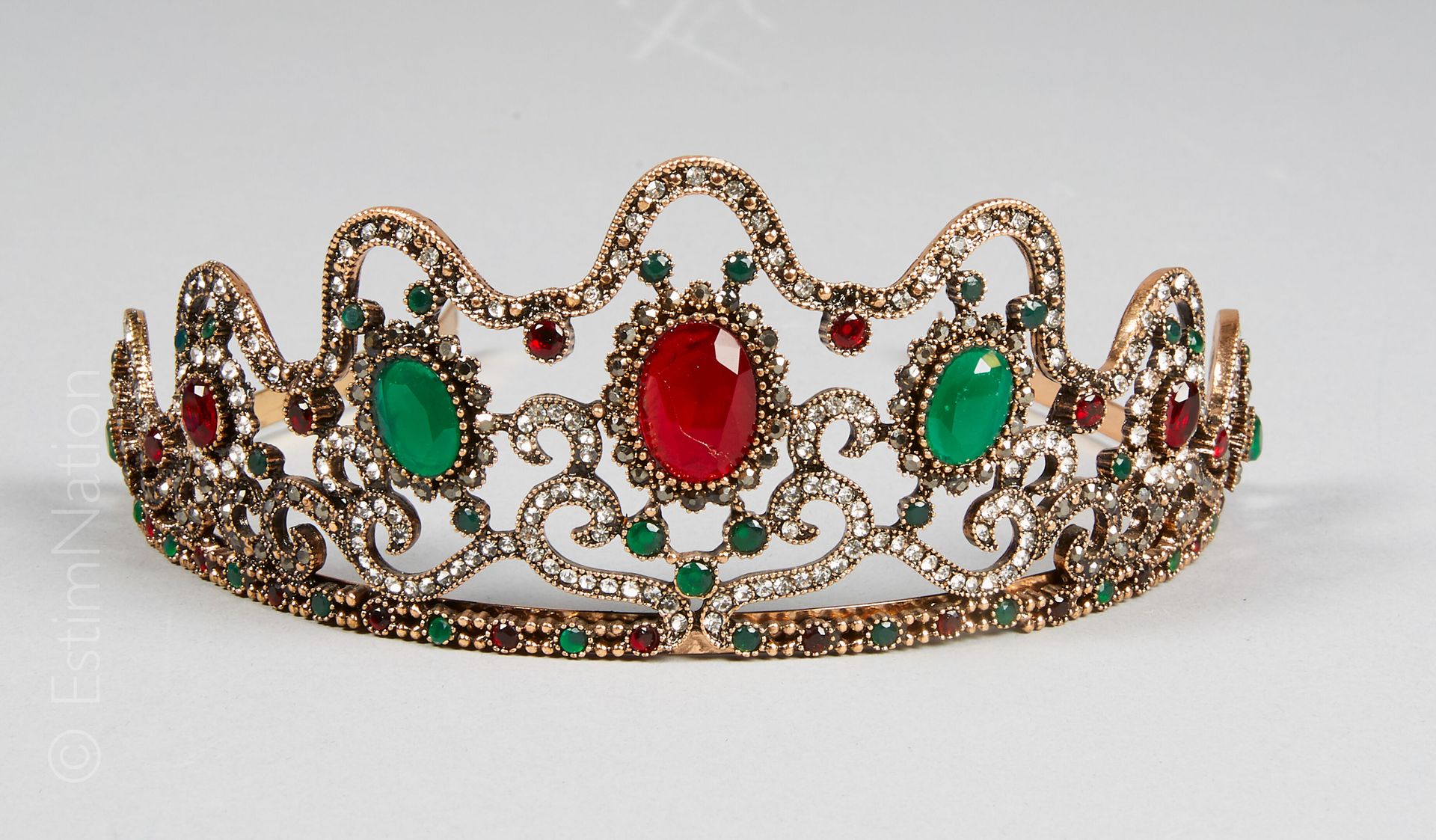 COURONNE D'APPARAT FANTAISIE Patinated bronze crown enhanced with fancy colored &hellip;