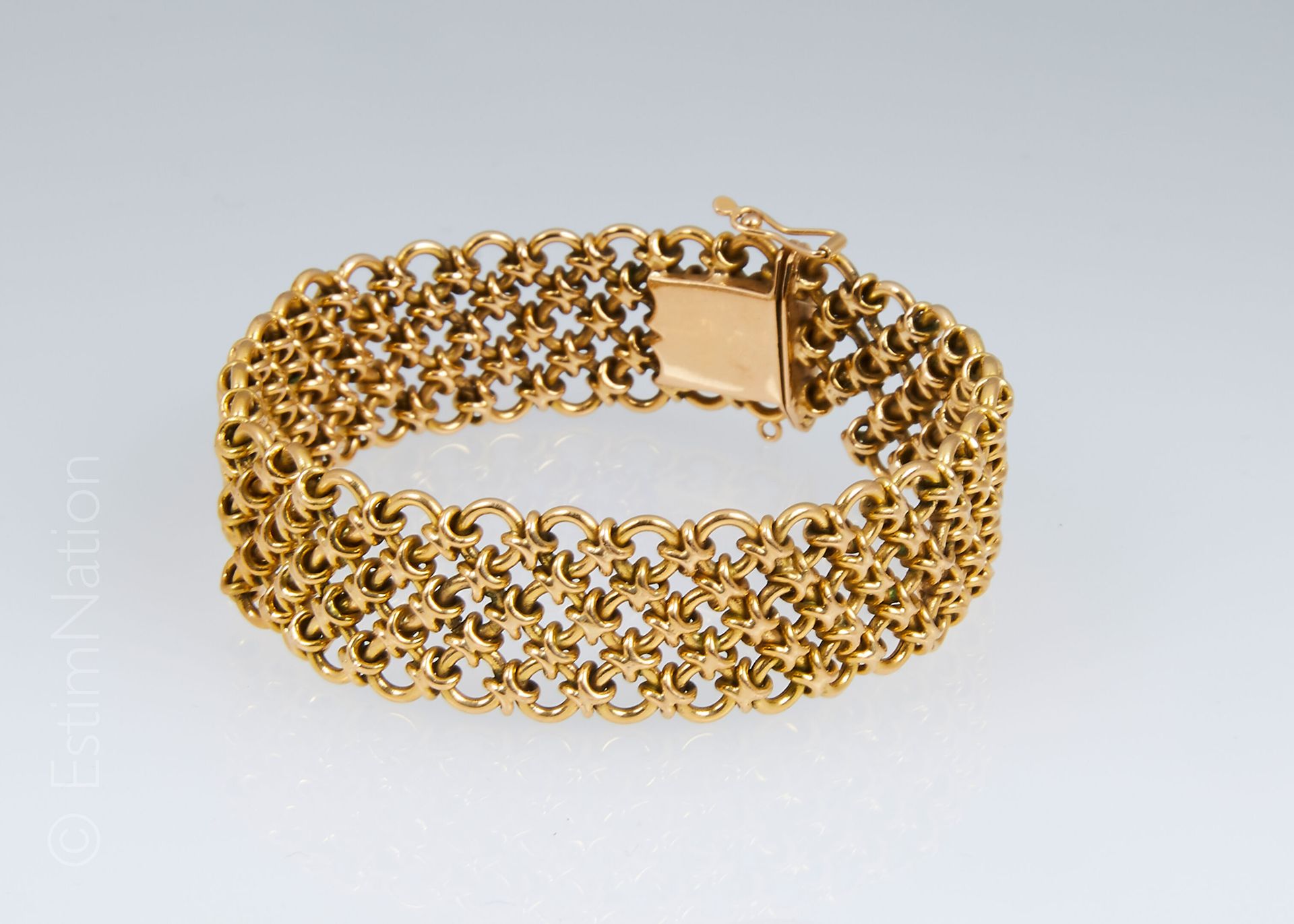 BRACELET OR Bracelet gourmette à maille entrelacée en or jaune 18K (750°/00). Ac&hellip;