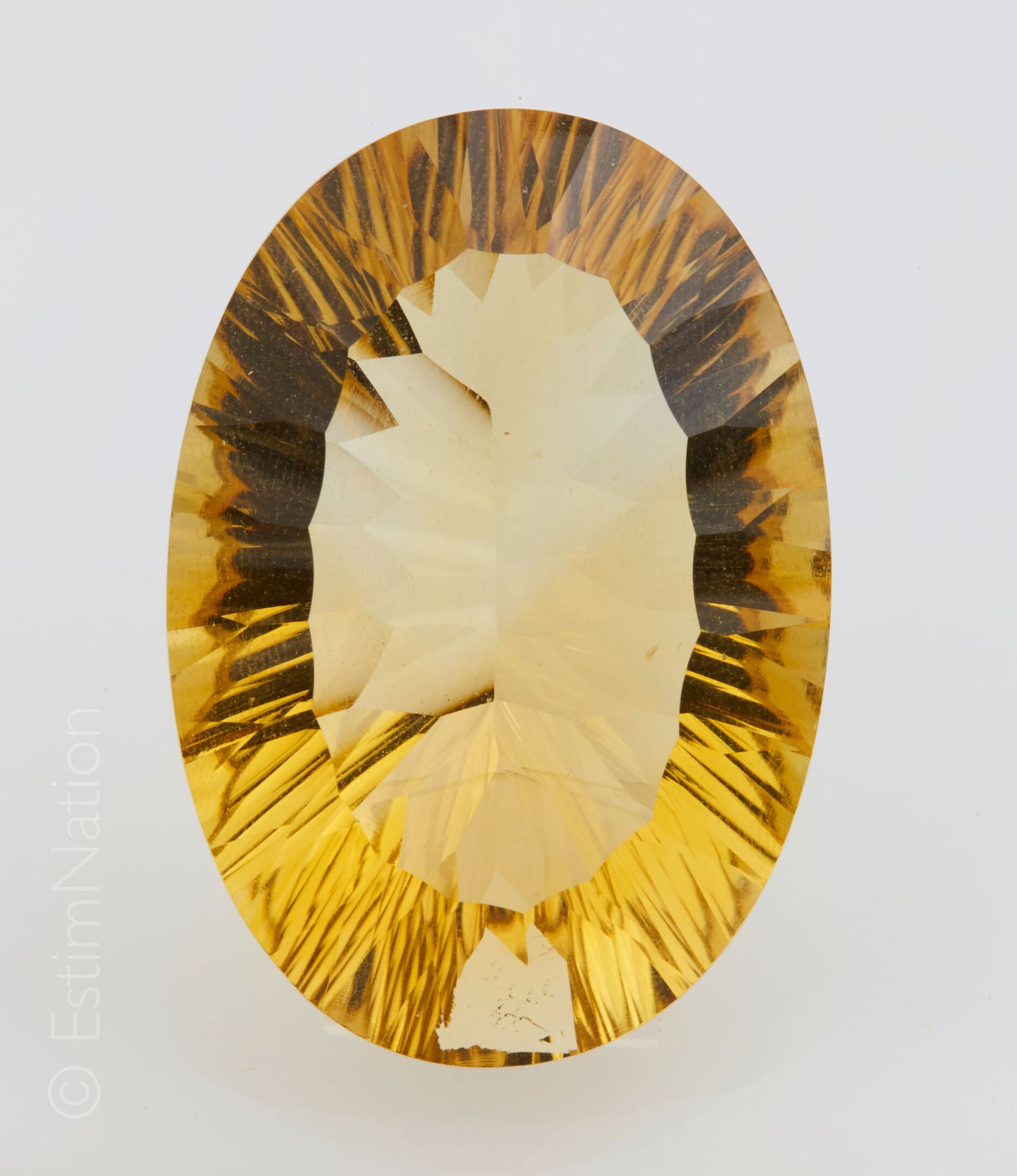 CITRINE 58 CARAT Concave faceted citrine weighing approximately 58 ct. 

Dimensi&hellip;