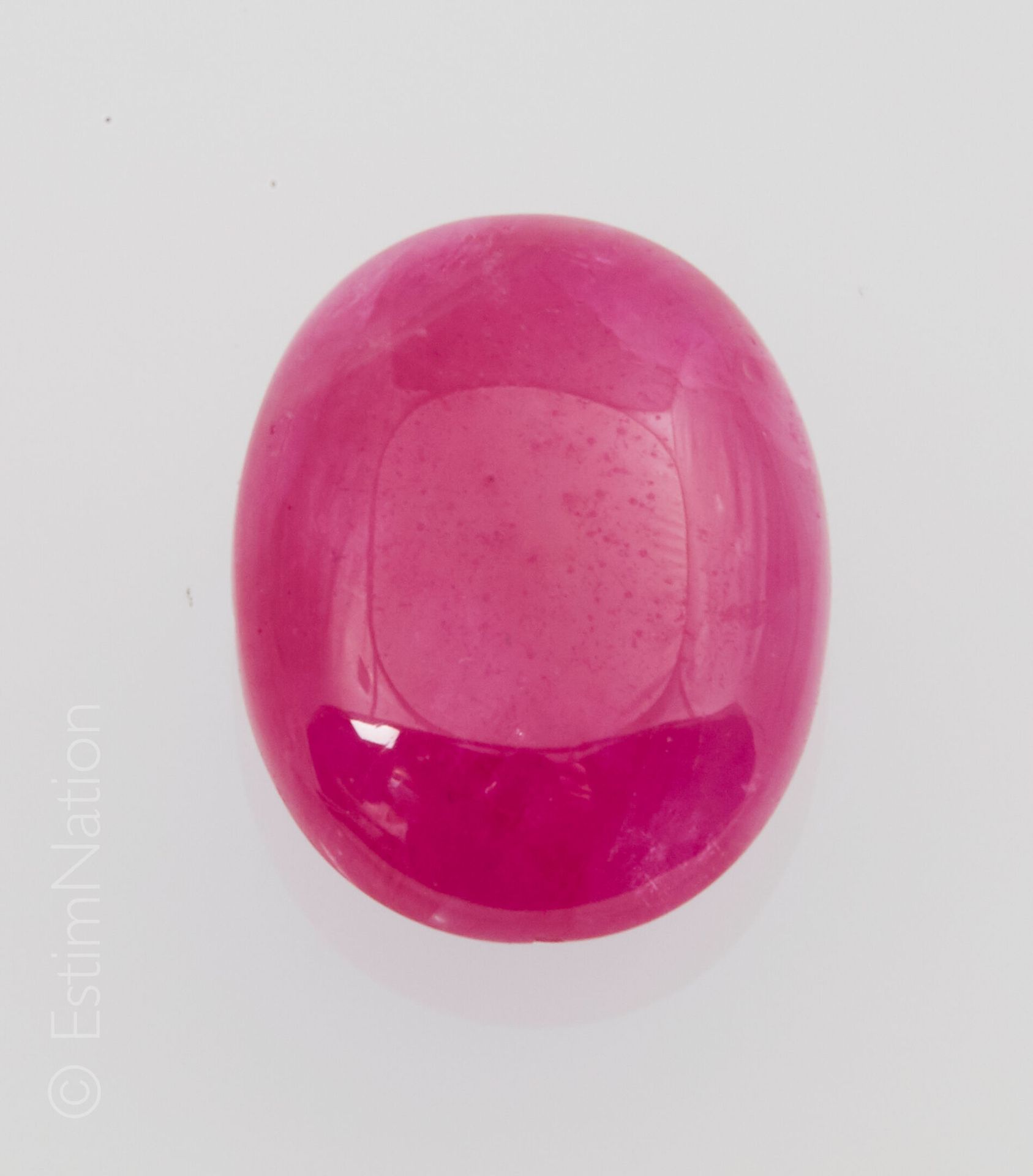RUBIS Ruby on paper in oval cabochon shape 

Dimensions : 8.90 x 6.85 x 3.15 mm &hellip;