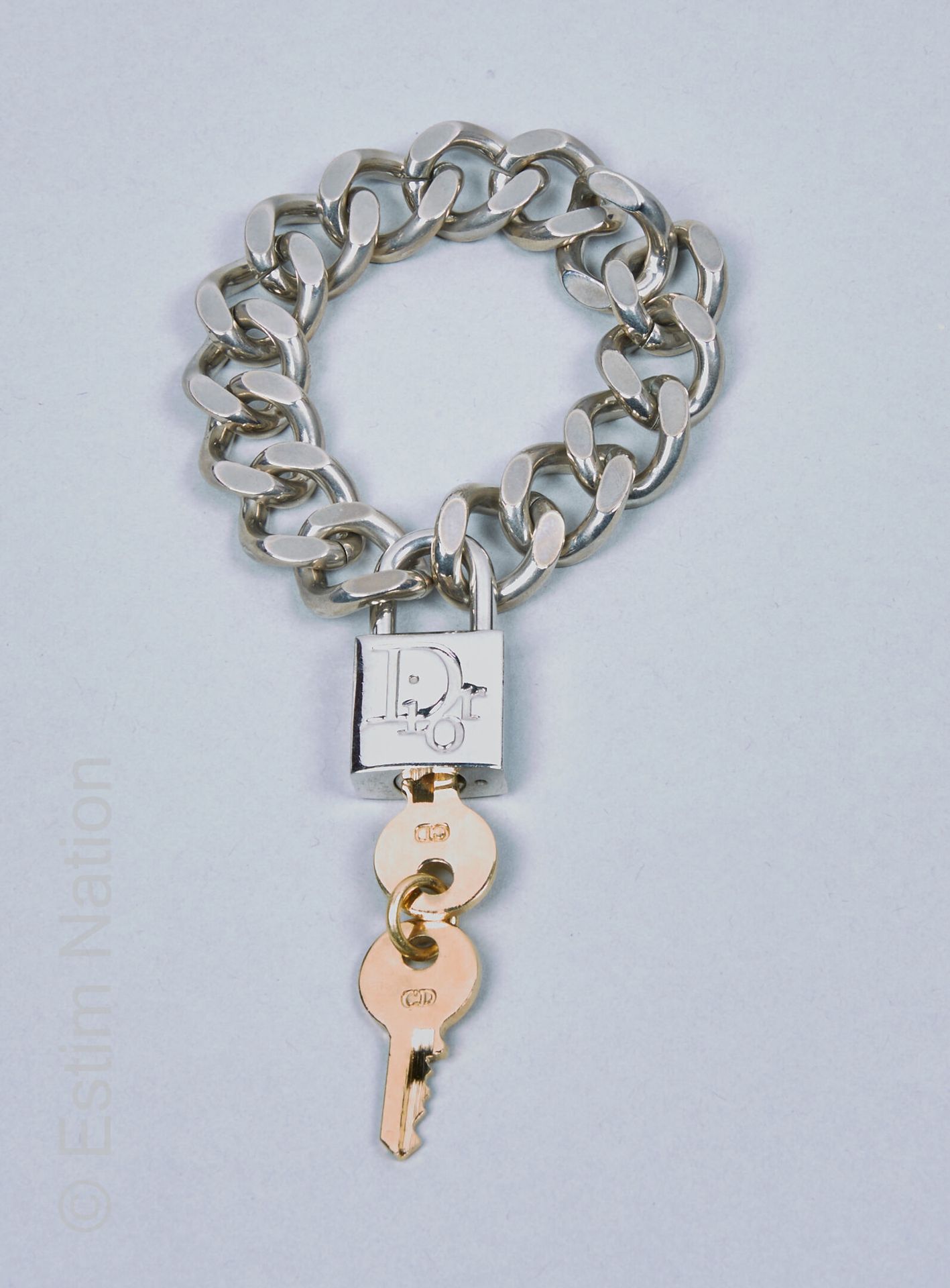 CHRISTIAN DIOR GOURMETTE cadenas en métal argenté avec deux clés en métal doré (&hellip;