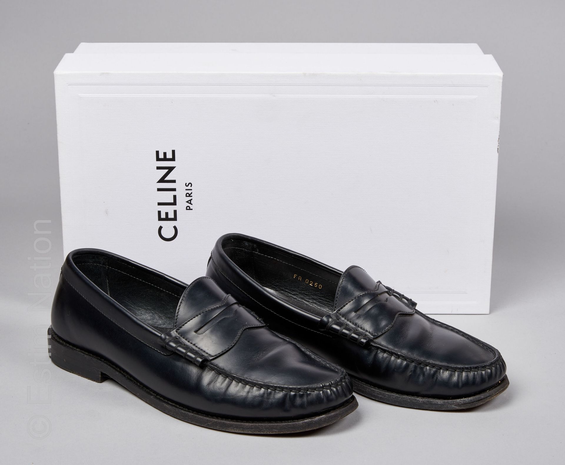 CELINE PAIR OF MOCASSINS in black glazed calf (P 39) (small patina of use, small&hellip;