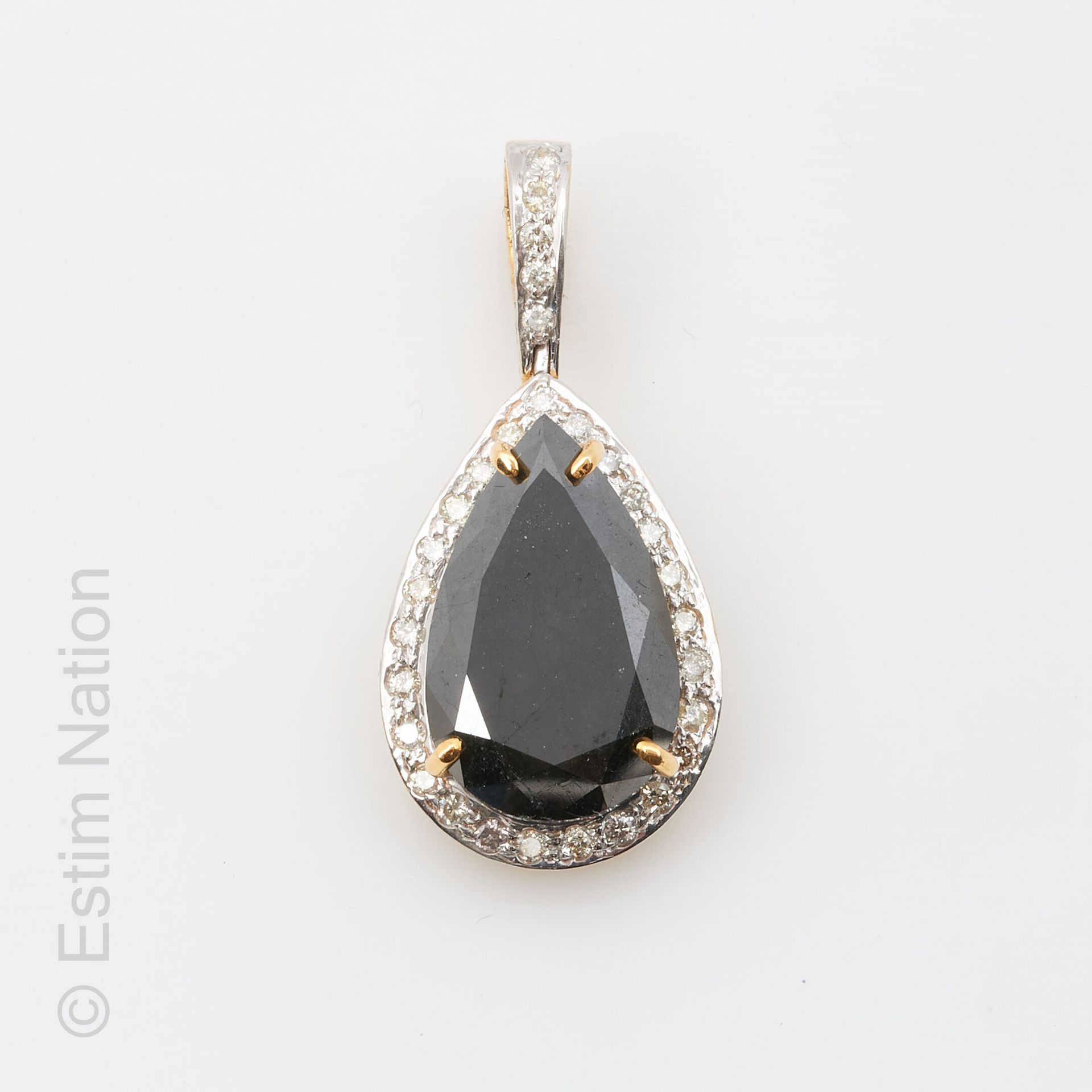 PENDENTIF OR ET DIAMANT NOIR 
Pendentif en or jaune et or gris 14K ( 585 millièm&hellip;