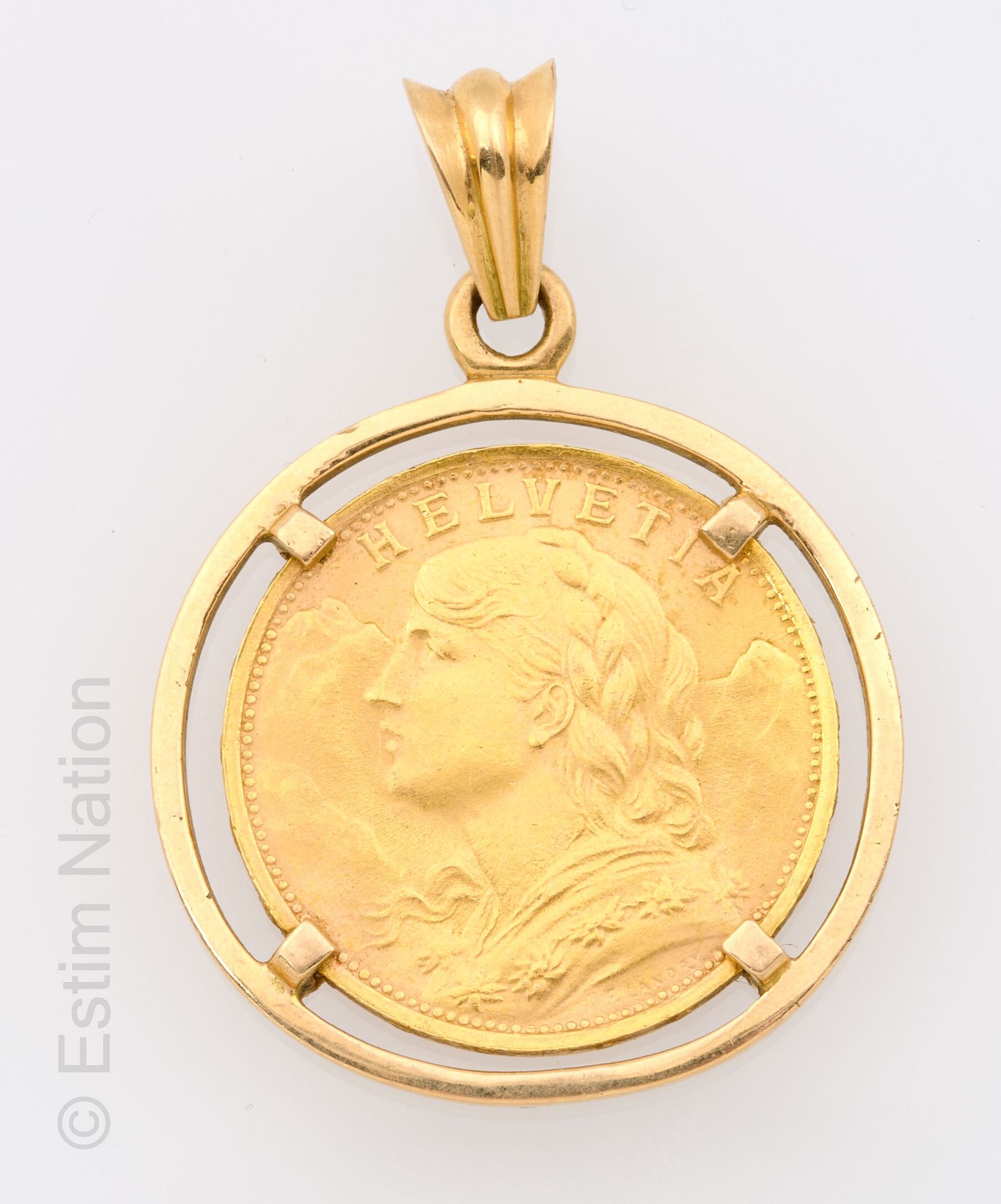 PENDENTIF PIECE DE 20 FRANCS OR Un pendentif en or jaune 18K (750/°°) centré d'u&hellip;