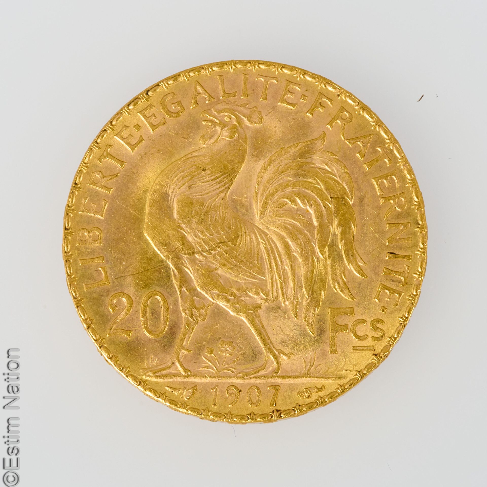 PIECE 20 F OR Eine Goldmünze von zwanzig Francs , 1907, mit Hahn. P. 6,4 g.