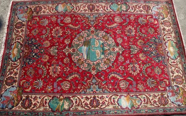Null Rectangular polychrome wool carpet decorated with a medallion showing two s&hellip;