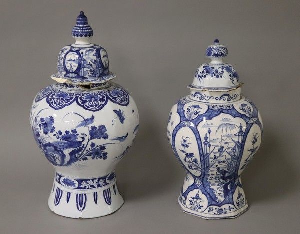 Null TWO LARGE covered earthenware pots of baluster shape, blue and white glazed&hellip;