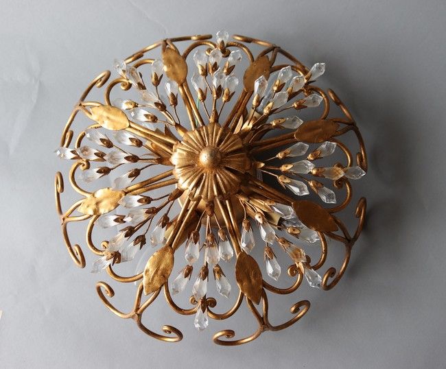 Null FLAMINE

Round gilded metal PLATEBOARD with openwork decoration set with gr&hellip;