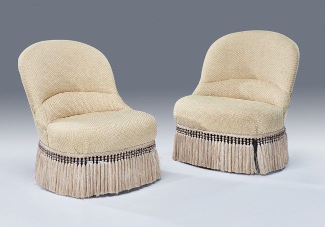 Null PAIR OF CRAPAUDS in blackened wood. Upholstery of pale yellow cotton with b&hellip;