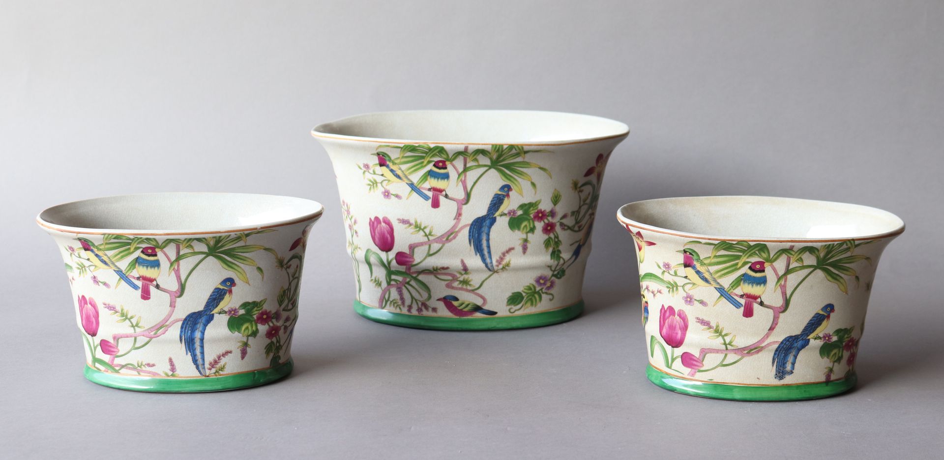 Null THREE GARDENERS oval enameled porcelain polychrome decoration of exotic bir&hellip;