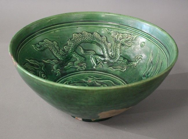Null CHINE, XIXe siècle

COUPE en grès émaillé vert à décor en relief de poisson&hellip;