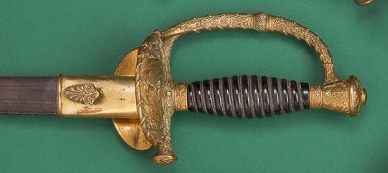 Null MARINE OFFICER'S
SWORDBlack varnished with filigree, chased brass mounting,&hellip;