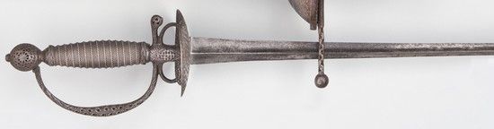 Null 军官
枪全铁丝（已修复），錾刻和镂空的铁架，单枝枪柄，驴子步和双壳。三角形刀片，有雕刻的遗迹。
18世纪中期A
.B.E - S.F
.