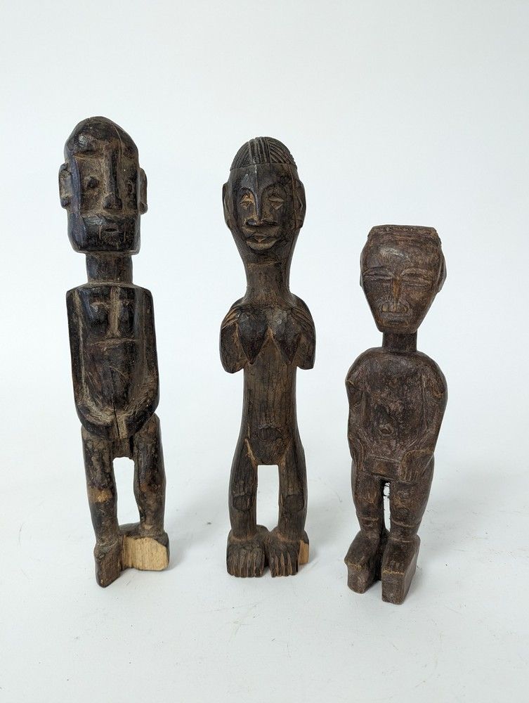 Null THREE STATUETTES, two male and one female.
Wood.
Baule or Agni, RCI.
Height&hellip;