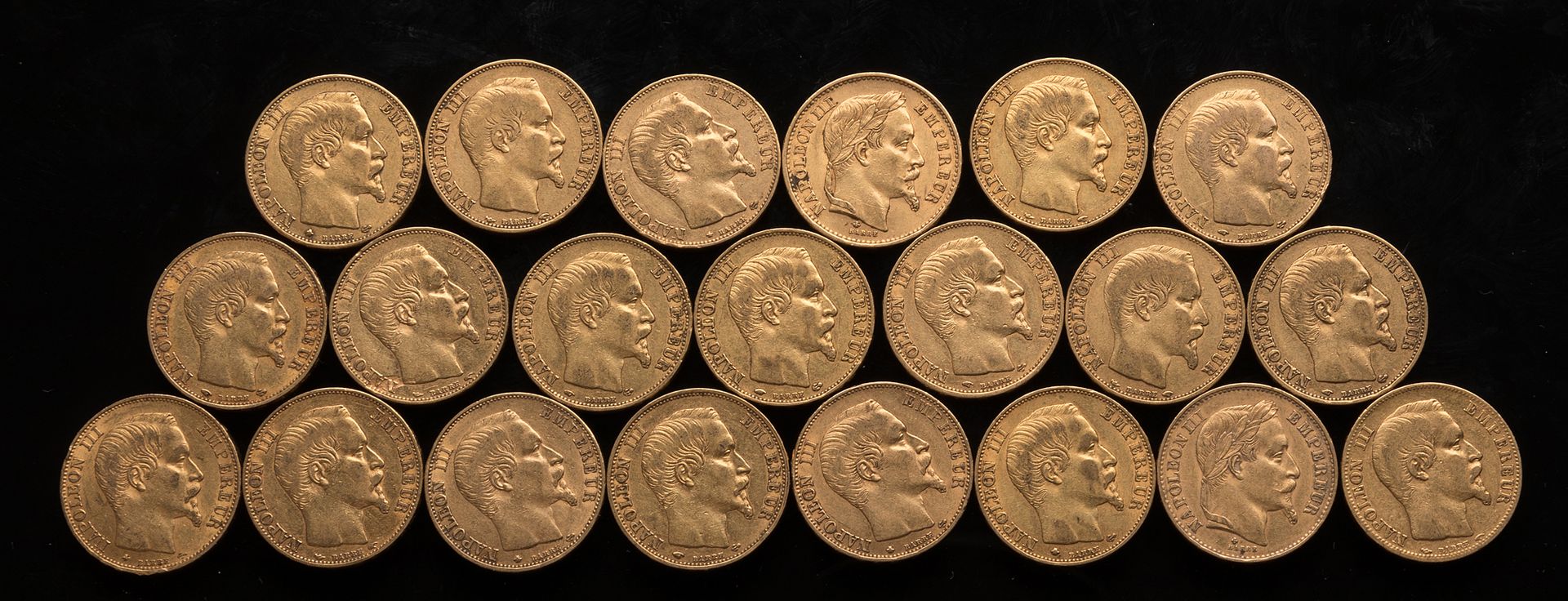 Null 
[Ventuno monete napoleoniche, due delle quali con teste.



1853 x 2, 1854&hellip;