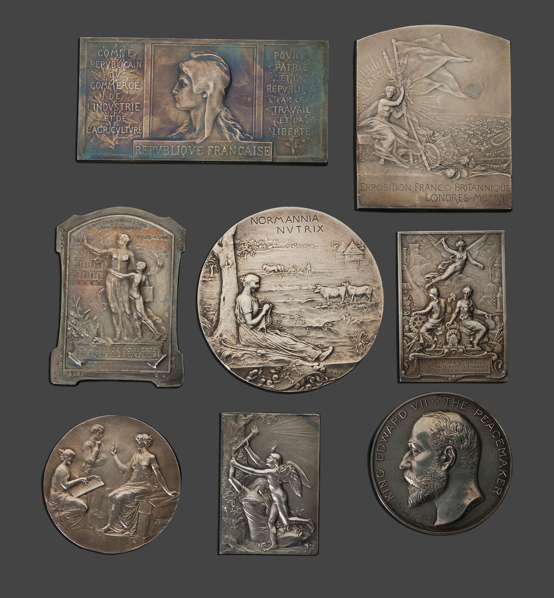 Null 八枚银质铜质奖章，包括罗文的殖民地展览，1908年伦敦，1900年巴黎...

20世纪初